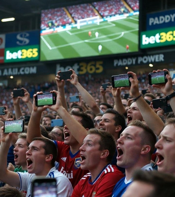 Fans watching EPL games on mobile devices with betting ads visible